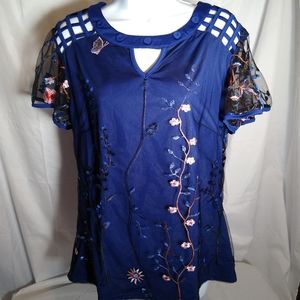 Woman's Top Embroidered. Flutter sleeves Size L